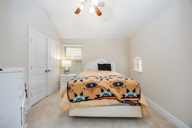 5142 Oasis Park, Houston, TX 77021 - bedroom featuring light colored carpet, vaulted ceiling, a ceiling fan, a closet, and baseboards