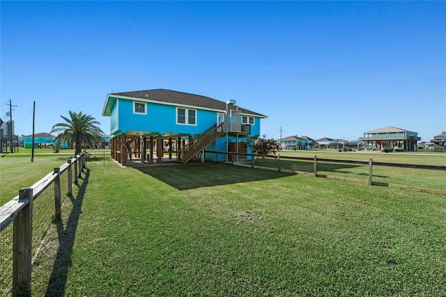 117 S Verdia Dr, Crystal Beach, TX 77650 - back of house with stairs