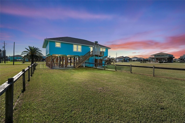 117 S Verdia Dr, Crystal Beach, TX 77650 - back of property at dusk with stairway