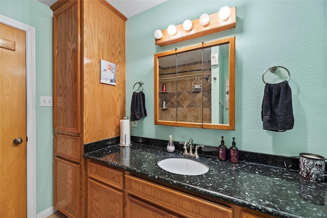 117 S Verdia Dr, Crystal Beach, TX 77650 - bathroom with vanity and a textured wall