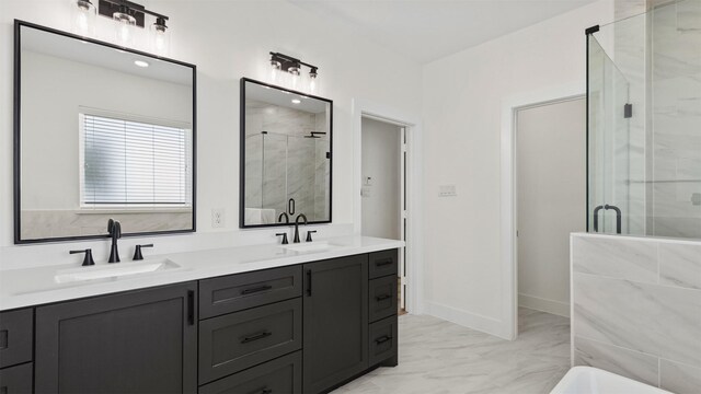 723 Marcella St Unit B, Houston, TX 77091 - bathroom with marble finish flooring, a stall shower, double vanity, a tub, and baseboards