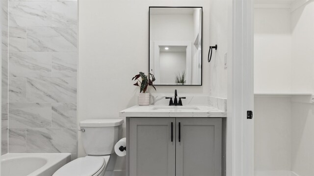 723 Marcella St Unit B, Houston, TX 77091 - bathroom with toilet, vanity, and shower / bathtub combination