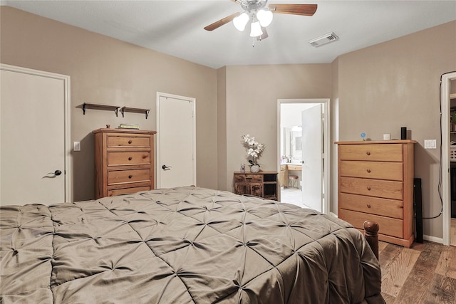 739 Apple Blossom Dr, Pearland, TX 77584 - bedroom with wood finished floors, ensuite bathroom, and ceiling fan
