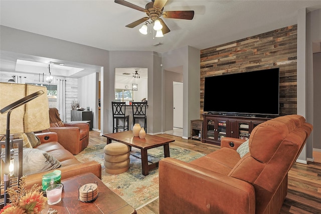739 Apple Blossom Dr, Pearland, TX 77584 - living room featuring a ceiling fan, wood finished floors, and baseboards