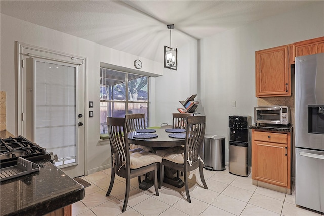 739 Apple Blossom Dr, Pearland, TX 77584 - dining area featuring light tile patterned floors