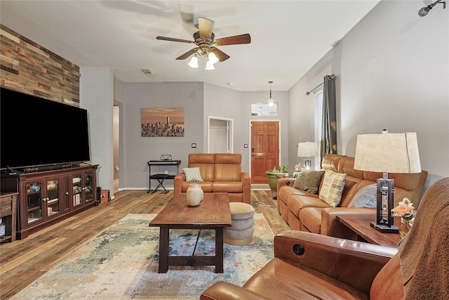 739 Apple Blossom Dr, Pearland, TX 77584 - living room featuring wood finished floors, ceiling fan, and baseboards