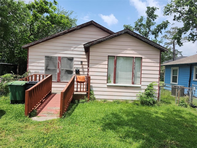4215 Edison St, Houston, TX 77009 - rear view of property with a deck