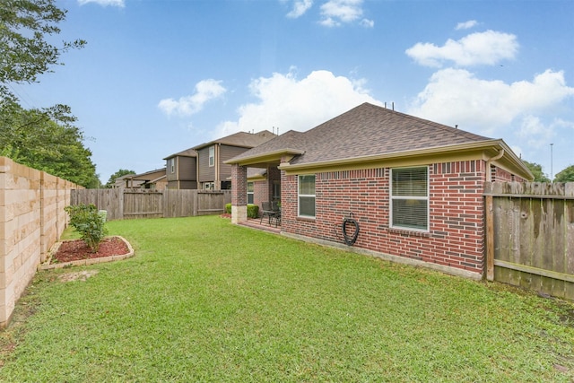 4223 Leafy Bough Ct, Humble, TX 77346 - rear view of house with roof with shingles and brick siding