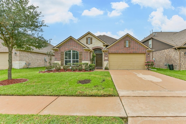 4223 Leafy Bough Ct, Humble, TX 77346 - view of front facade with brick siding, a garage, a front lawn, and concrete driveway