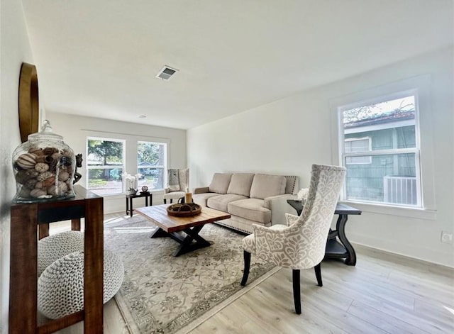 319 Wisteria St, Lake Jackson, TX 77566 - living area featuring light wood-type flooring and baseboards