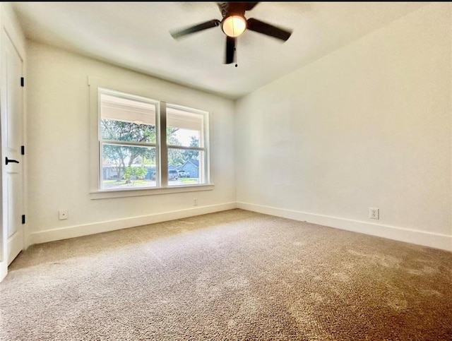 319 Wisteria St, Lake Jackson, TX 77566 - spare room featuring light carpet, ceiling fan, and baseboards