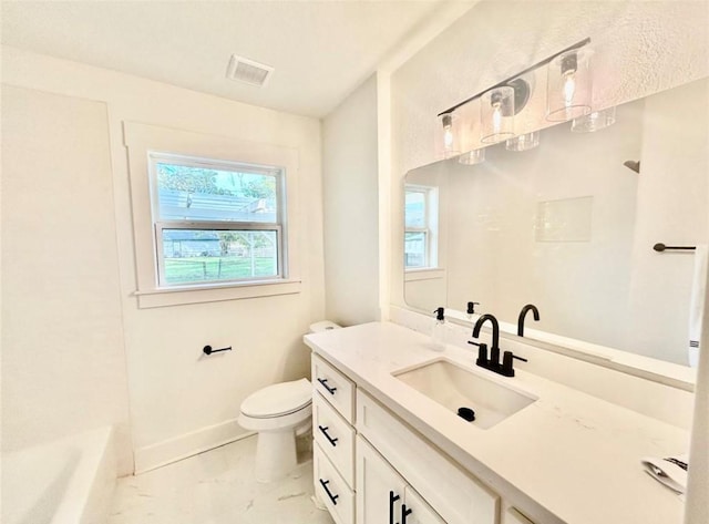 319 Wisteria St, Lake Jackson, TX 77566 - bathroom with vanity, marble look tile flooring, toilet, and baseboards