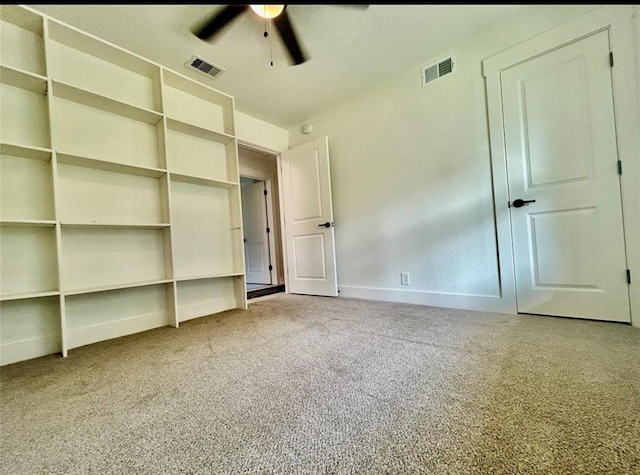 319 Wisteria St, Lake Jackson, TX 77566 - unfurnished bedroom featuring light carpet, baseboards, and a ceiling fan