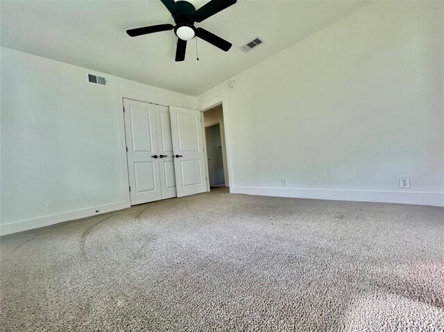 319 Wisteria St, Lake Jackson, TX 77566 - unfurnished bedroom with baseboards, a closet, light colored carpet, and a ceiling fan