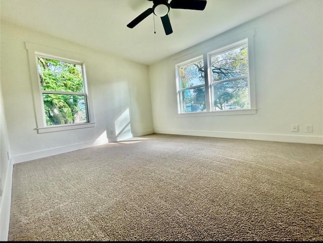 319 Wisteria St, Lake Jackson, TX 77566 - empty room with carpet flooring, baseboards, and ceiling fan