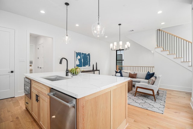 515 E 4th St, Houston, TX 77007 - kitchen featuring a sink, appliances with stainless steel finishes, light wood-style flooring, light brown cabinets, and recessed lighting