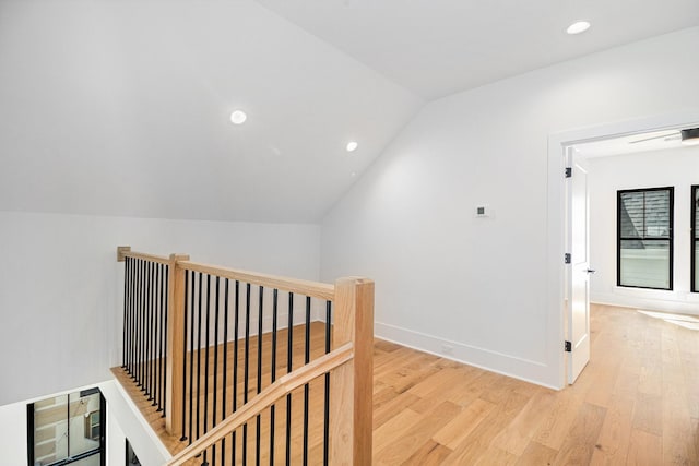 515 E 4th St, Houston, TX 77007 - hall featuring an upstairs landing, light wood-style flooring, vaulted ceiling, recessed lighting, and baseboards
