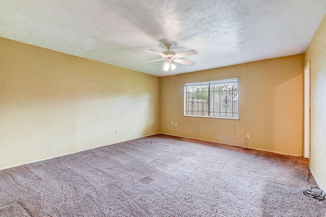 4919 Prairie Ridge Rd, Houston, TX 77053 - unfurnished room featuring ceiling fan, carpet, and a textured ceiling