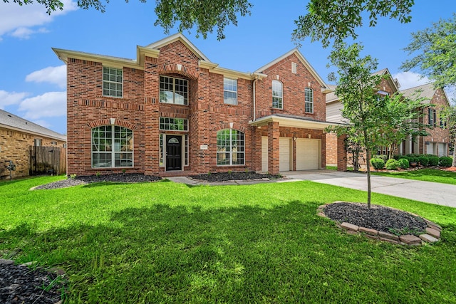 13707 Kingston River Ln, Houston, TX 77044 - view of front of home featuring concrete driveway, a garage, and brick siding