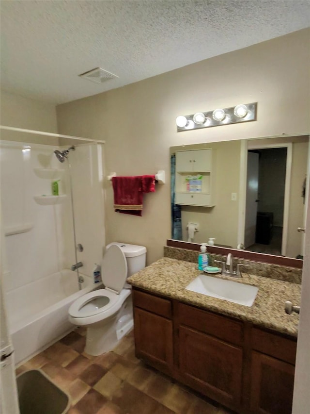 2501 Gulf Fwy Unit 249D, Dickinson, TX 77539 - bathroom with vanity, bathing tub / shower combination, a textured ceiling, and tile patterned floors