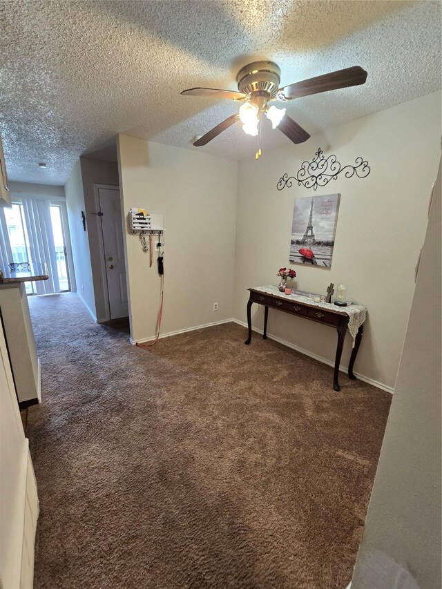 2501 Gulf Fwy Unit 249D, Dickinson, TX 77539 - carpeted spare room featuring a textured ceiling and a ceiling fan
