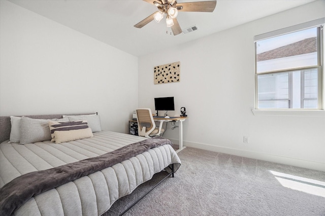 406 Welch St, Houston, TX 77006 - carpeted bedroom with baseboards and a ceiling fan