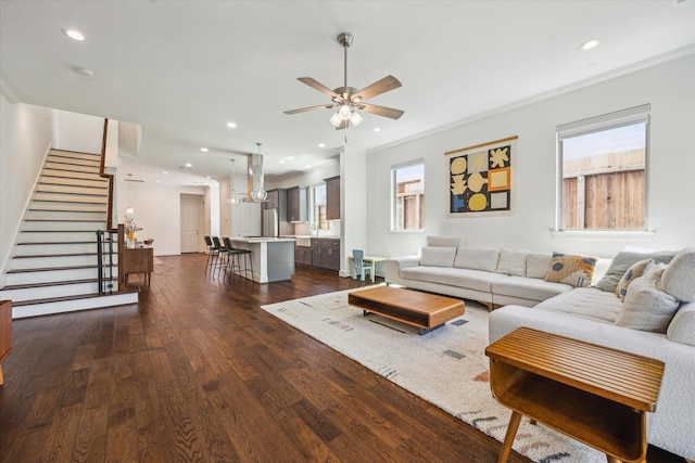 406 Welch St, Houston, TX 77006 - living area with dark wood-style floors, a ceiling fan, stairway, crown molding, and recessed lighting