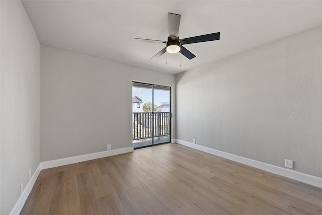 2829 Timmons Ln Unit 222, Houston, TX 77027 - empty room with light wood-style floors, a ceiling fan, and baseboards