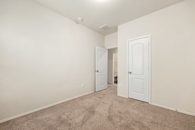 5323 Camerford Ct, Alvin, TX 77511 - unfurnished bedroom featuring light colored carpet and baseboards
