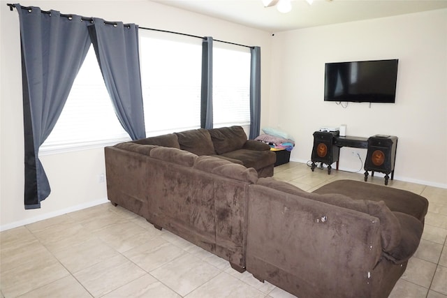 1608 Grable Cove Ln, Spring, TX 77379 - living area featuring light tile patterned flooring and baseboards