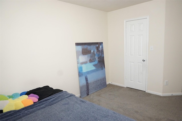 1608 Grable Cove Ln, Spring, TX 77379 - carpeted bedroom featuring baseboards