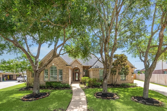 2703 Kestrel Trace Ln, Katy, TX 77494 - traditional home featuring brick siding