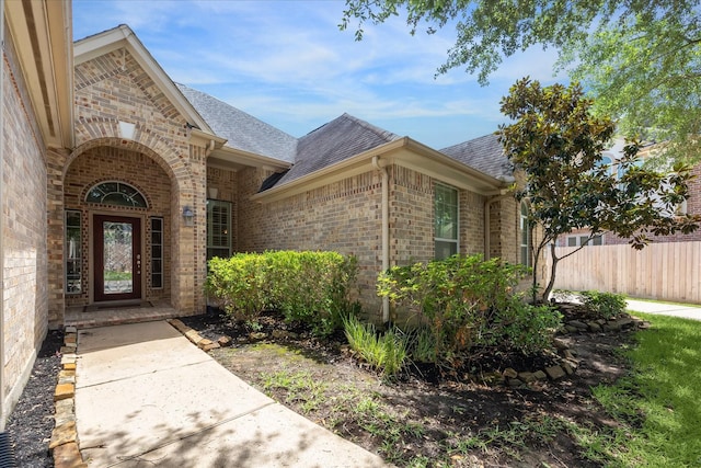 2703 Kestrel Trace Ln, Katy, TX 77494 - entrance to property with brick siding and roof with shingles