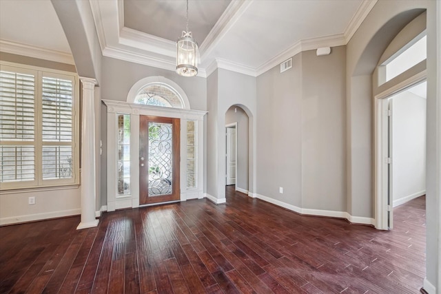 2703 Kestrel Trace Ln, Katy, TX 77494 - entryway featuring arched walkways, baseboards, hardwood / wood-style floors, a tray ceiling, and ornamental molding