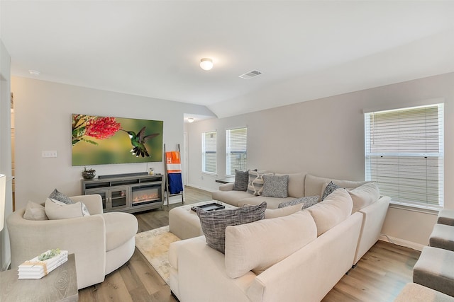 23607 Buttress Root Dr, Spring, TX 77373 - living area featuring light wood finished floors, baseboards, and lofted ceiling