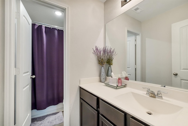 23607 Buttress Root Dr, Spring, TX 77373 - full bathroom featuring vanity and a shower with shower curtain
