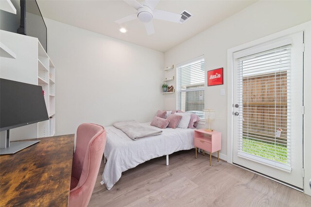 6307 Chelsea Falls Ln, Houston, TX 77008 - bedroom featuring wood finished floors, ceiling fan, and recessed lighting