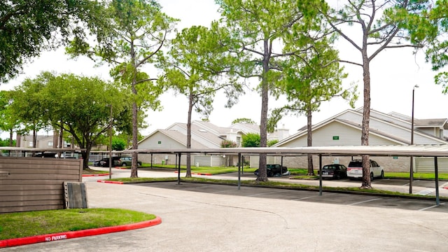 11881 Bob White Dr Unit 828, Houston, TX 77035 - view of community with covered parking and a residential view