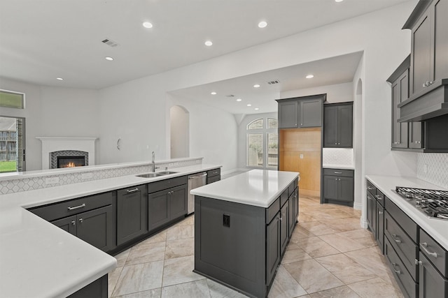 13303 Itasca Pine Dr, Humble, TX 77346 - kitchen featuring a sink, stainless steel appliances, recessed lighting, decorative backsplash, and light countertops