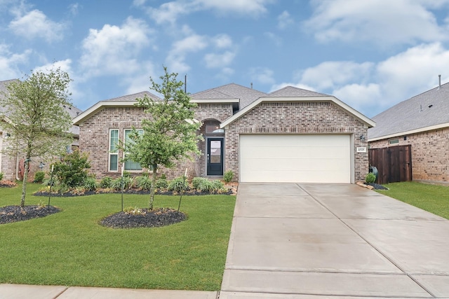 4818 Penton Meadow Ln, Rosharon, TX 77583 - french provincial home featuring brick siding, an attached garage, and driveway