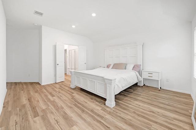 4818 Penton Meadow Ln, Rosharon, TX 77583 - bedroom with light wood-type flooring, baseboards, recessed lighting, and connected bathroom