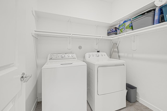 21746 Heather Elm Dr, Cypress, TX 77433 - laundry area featuring independent washer and dryer and baseboards