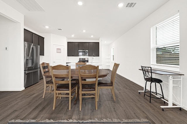 21746 Heather Elm Dr, Cypress, TX 77433 - dining room with dark wood-style floors, baseboards, and recessed lighting