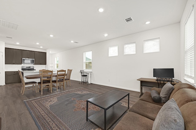 21746 Heather Elm Dr, Cypress, TX 77433 - living room with dark wood-style flooring, recessed lighting, and baseboards