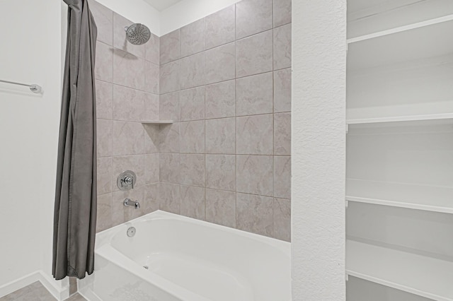 21746 Heather Elm Dr, Cypress, TX 77433 - full bathroom featuring shower / bathtub combination with curtain and baseboards