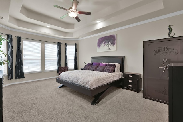 5015 Gold Lantana Trl, Spring, TX 77389 - carpeted bedroom featuring a tray ceiling, crown molding, a ceiling fan, recessed lighting, and baseboards