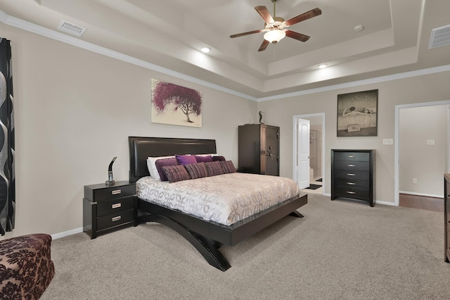 5015 Gold Lantana Trl, Spring, TX 77389 - bedroom featuring a tray ceiling, light carpet, baseboards, crown molding, and recessed lighting