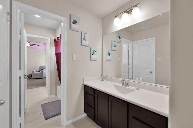 5015 Gold Lantana Trl, Spring, TX 77389 - bathroom featuring vanity and baseboards