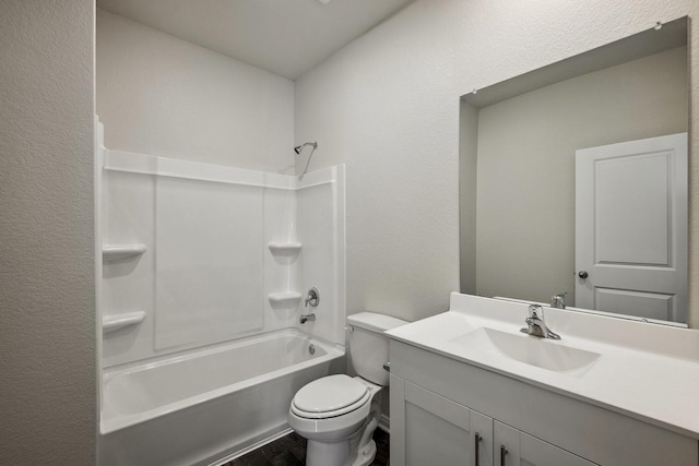 10347 Red Cardinal Dr, Cleveland, TX 77328 - full bath featuring vanity, tub / shower combination, toilet, wood finished floors, and a textured wall