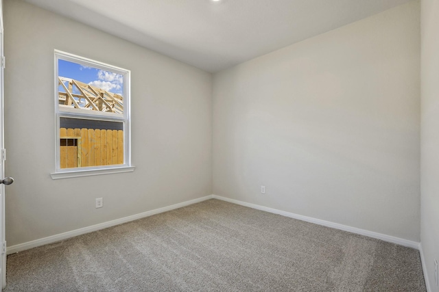 10347 Red Cardinal Dr, Cleveland, TX 77328 - empty room with carpet and baseboards